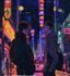 耽美漫画《霓虹之夜》封面，现代都市夜生活风格，两位男主角在霓虹灯闪烁的街头相遇，画面时髦感强